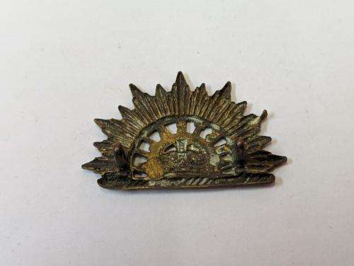 Australian Rising Sun Collar badge. Boer War to WWI. Lugs crimped.