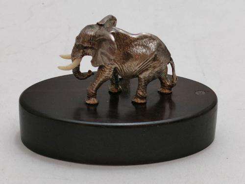 Patrick Mavros Sterling Silver Elephant Bull Place Card Holder with bone tusks.