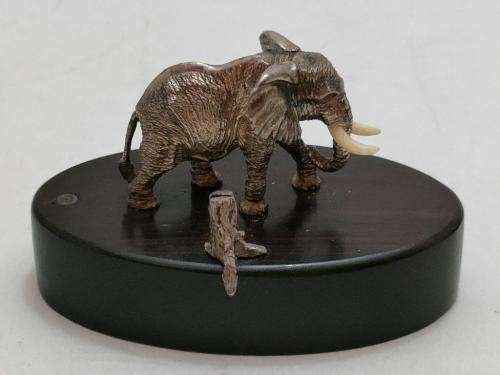 Patrick Mavros Sterling Silver Elephant Bull Place Card Holder with bone tusks.