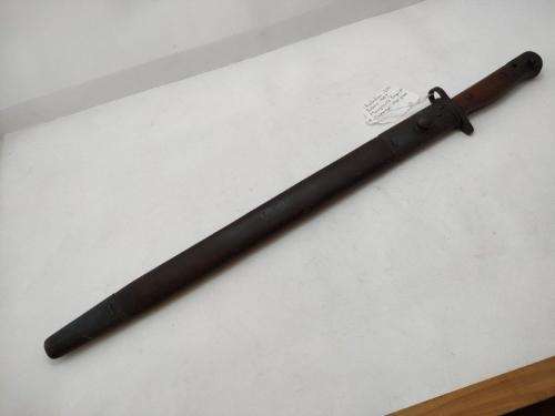 Australian Pattern 1907 Mangrovite Bayonet and sheat with Slazanger grips.