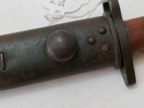 Australian Pattern 1907 Mangrovite Bayonet and sheat with Slazanger grips.