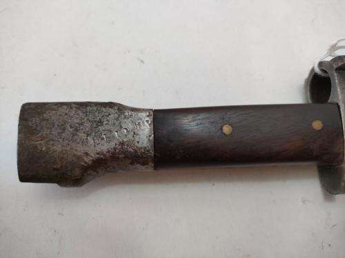 Belguim FN Bayonet and sheath. As used by SAP. Replaced wooden grips and release button missing.