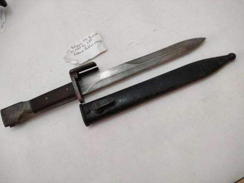 Belguim FN Bayonet and sheath. As used by SAP. Replaced wooden grips and release button missing.
