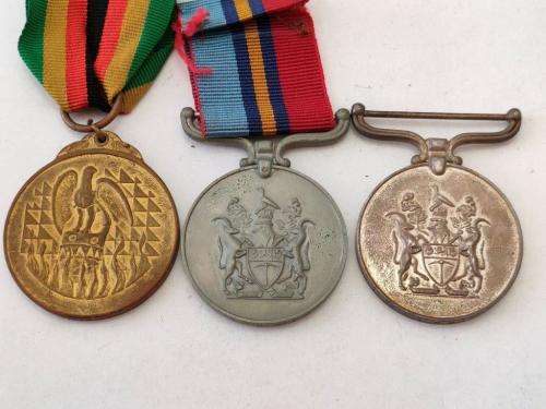 Rhodesain General Service, Zim Independence and Police medal awarded to 7711F F/R R.D. Lawrence