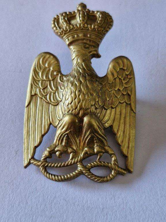 WWII Italian Colonial Police Cap badge 45 x 80 mm. Screw posts intact.