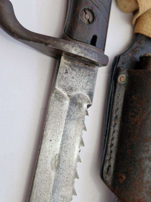 WWI German S98/05 Sawback butcher bayonet with 4th infantry company knot. Mauser AG 1916.