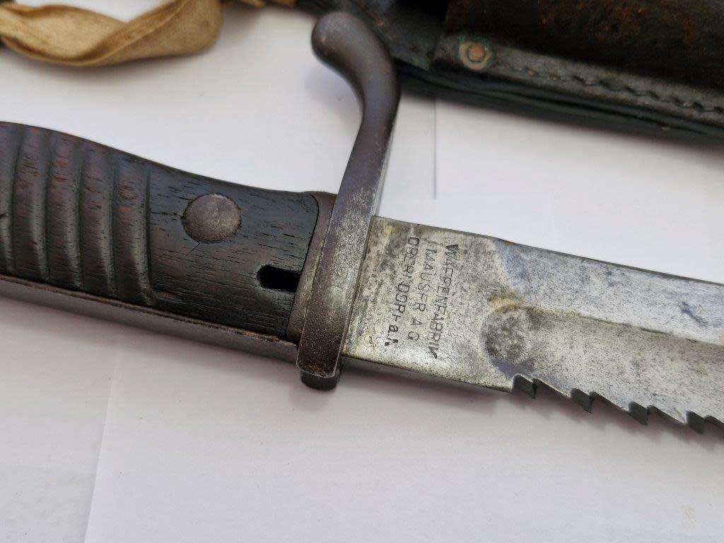 WWI German S98/05 Sawback butcher bayonet with 4th infantry company knot. Mauser AG 1916.