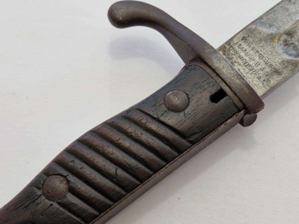 WWI German S98/05 Sawback butcher bayonet with 4th infantry company knot. Mauser AG 1916.