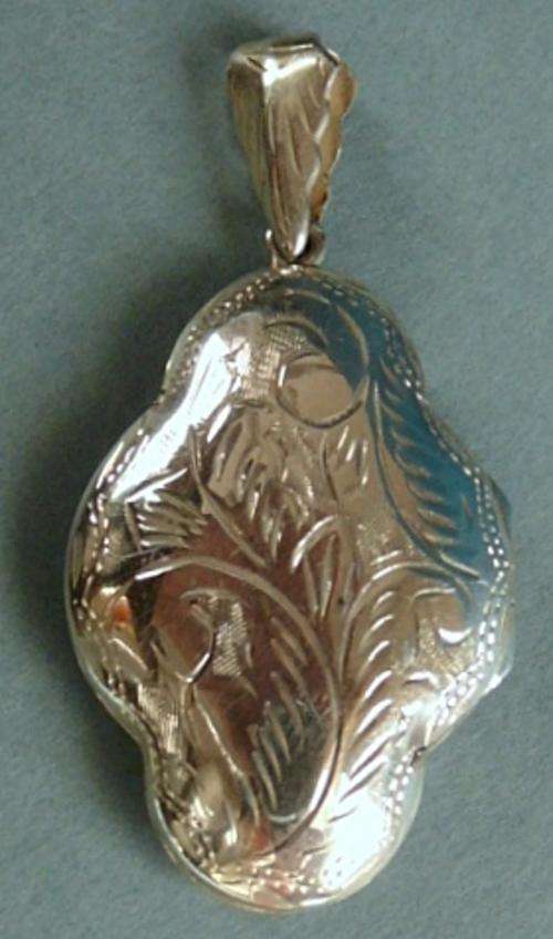 STERLING SILVER ENGRAVED LOCKET.BEAUTIFUL!