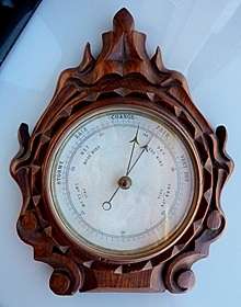 ANTIQUE BAROMETER IN ORNATE CARVED WOOD,WORKING.STUNNING!