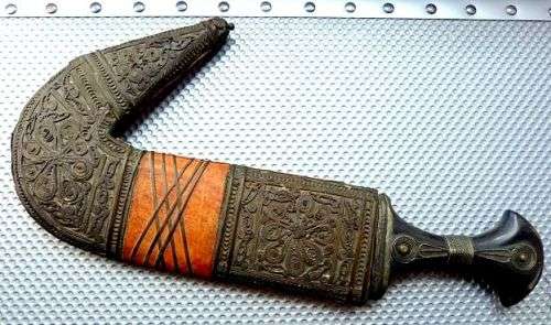 ORIENTAL SWORD IN SCABBORD,HIGHLY DECORATED.  GENUINE LEATHER