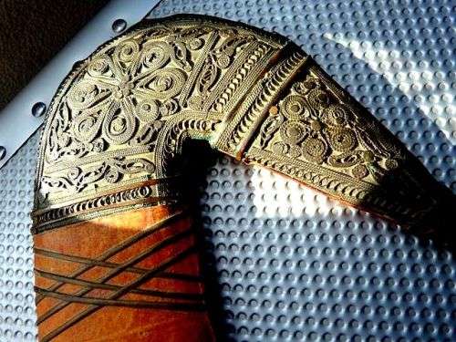 ORIENTAL SWORD IN SCABBORD,HIGHLY DECORATED.  GENUINE LEATHER