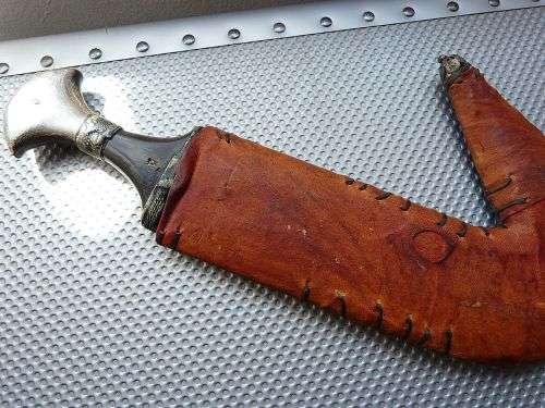 ORIENTAL SWORD IN SCABBORD,HIGHLY DECORATED.  GENUINE LEATHER