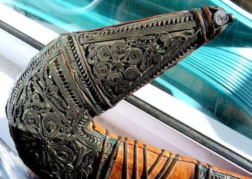 ORIENTAL SWORD IN SCABBORD,HIGHLY DECORATED.  GENUINE LEATHER