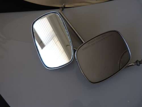 2 VINTAGE MOTORBIKE MIRRORS, ONE IS A HARLEY DAVIDSON.