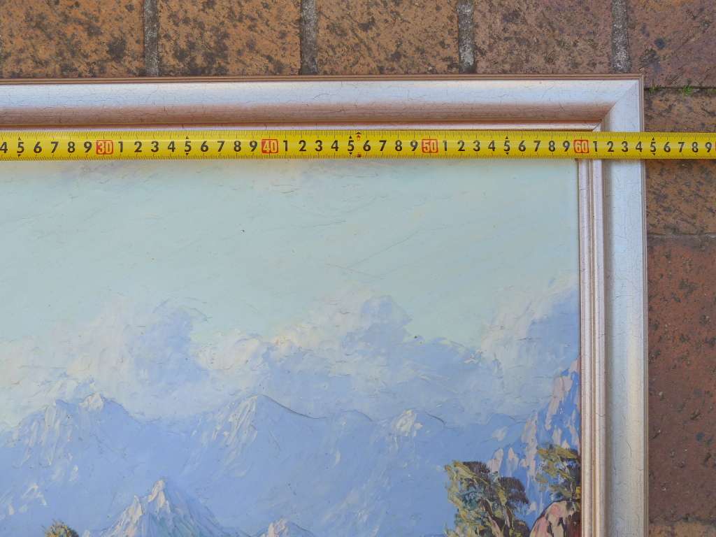 PAINTING OF A VALLEY WITH STREAM AND MOUNTAINS, SIGNED BY ARTIST.OIL ON BOARD.FRAMED