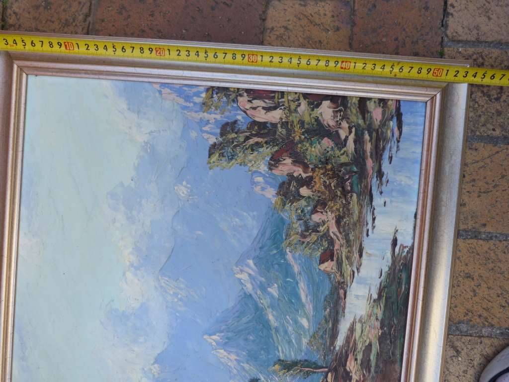 PAINTING OF A VALLEY WITH STREAM AND MOUNTAINS, SIGNED BY ARTIST.OIL ON BOARD.FRAMED