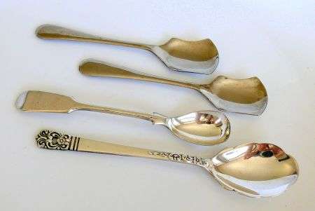 FOUR SILVER PLATED SPOONS