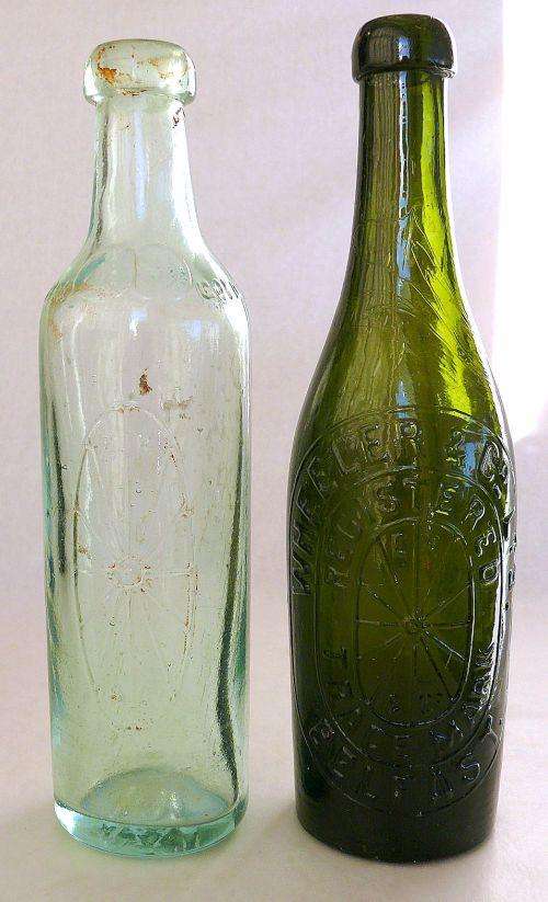 TWO GLASS BOTTLES ,BELFAST 1895
