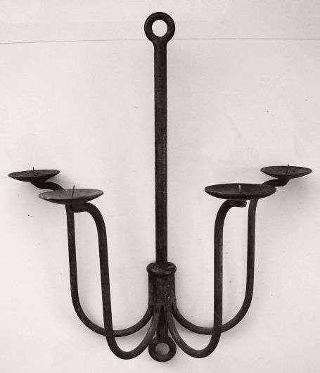 FOUR ARMED IRON WALL CANDLESTICK