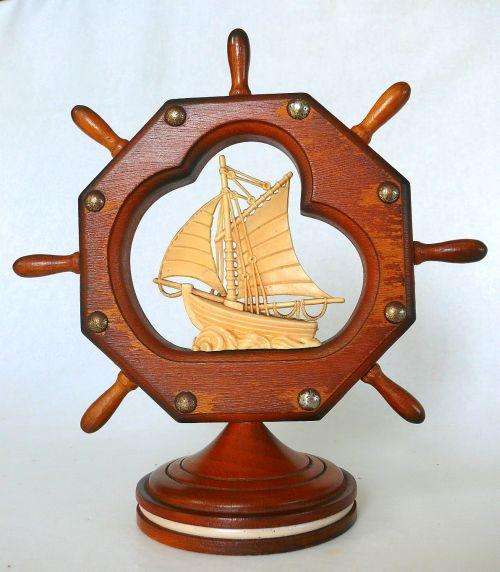 SHIP(RESIN) IN SHIP'S WHEEL STYLE WOODEN FRAME (OCTAGONAL)