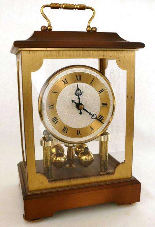 HERMLE TORSIONS PENDULUM CLOCK,QUARTZ 967,RESIN/BRASS,MADE IN GERMANY,WORKING