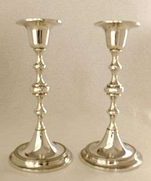 A PAIR OF SILVER PLATED CANDLESTICKS,MADE IN WEST GERMANY