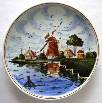WALL PLATE,COLOURED DELFT-BLUE ,HAND PAINTED MADE IN HOLLAND