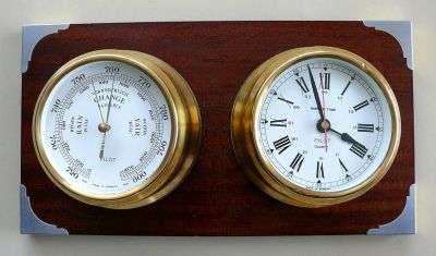 BRASS SHIP'S CLOCK AND BAROMETER ON WOODEN BASE,WORKING