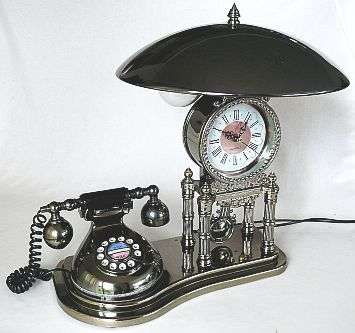 PHONE,CLOCK AND LAMP DESK SET,PLASTIC MATERIAL,PLEASE NOTE...