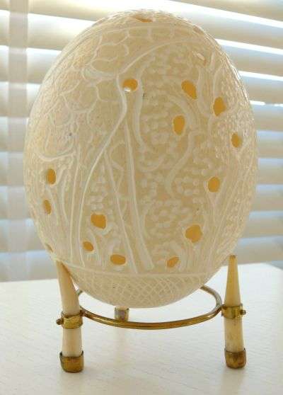 CARVED OSTRICH EGG ON STAND (OR LAMPSHADE)