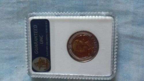 GUARENTEED uncirculated and slabbed by s.a.c.g.s 2008 mandela R5