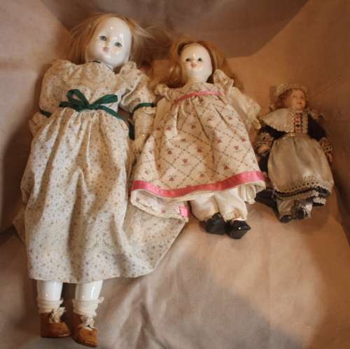 Three Vintage Porcelain Dolls **One bid for lot of three**