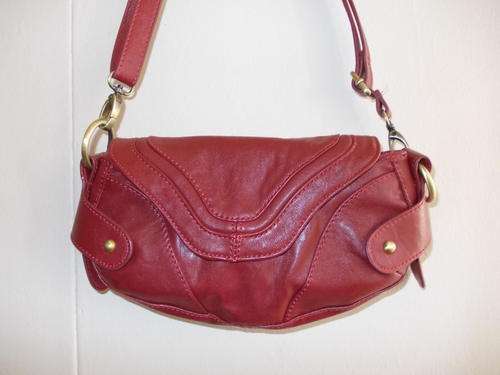Brick-red purse from HONEY