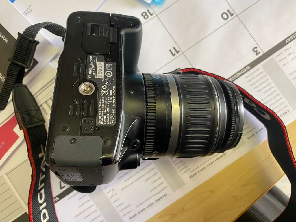 Canon 1000D camera with lens,battery,and charger