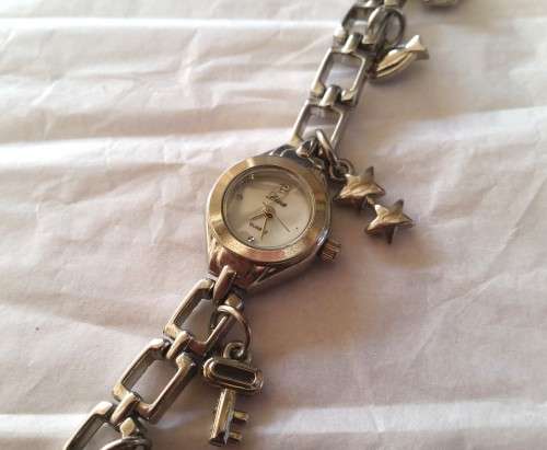 Woman`s Silver Plated Analogue Charm Watch