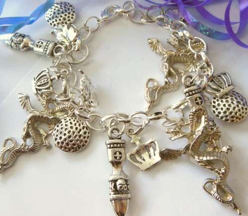 Silvertone Charm Bracelet with Dragon and Leaf Charm