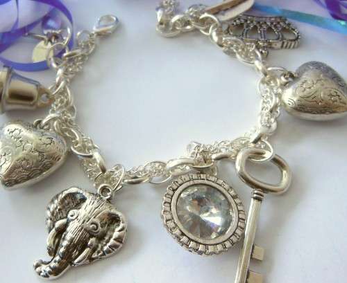 Silvertone Charm Bracelet with Elephant, Heart, Key and Bell Charms