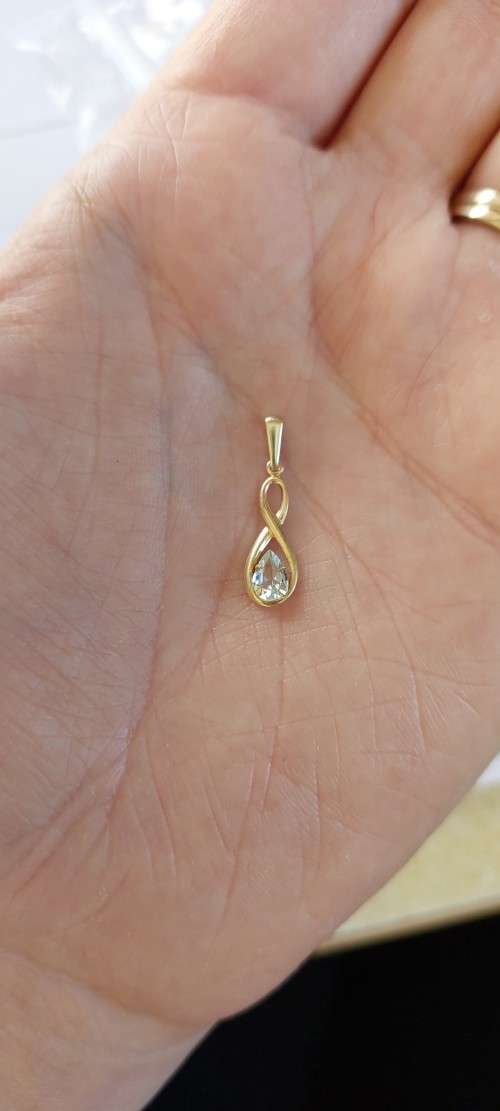 0.50ctw Natural Topaz Infinity Pendant in 9k Yellow Gold