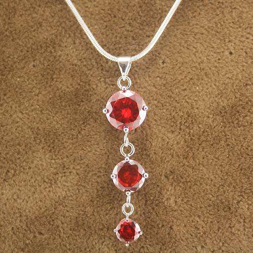 **it's all in the SPARKLE**3 Ruby drop pendant**