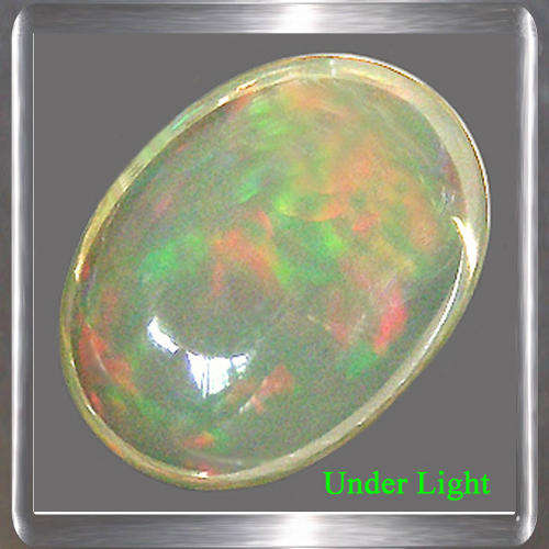 White Opal with flashes of colour 1.14ct Oval Cabochon