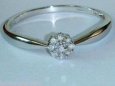 STUNNING 9CT SOLID  WHITE GOLD RING WITH .150 CT DIAMONDS size 9