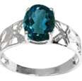 LOVELY SOLID 10 K  GOLD RING WITH  LONDON BLUE TOPAZ