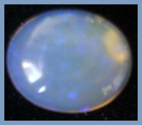 BEAUTIFUL NATURAL RAINBOW OPAL  ROUND 1.68CT