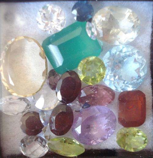AWESOME LOT OF MIXED GEMS 34.48CT - TOPAZ, AMETHYSTS ETC