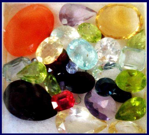 AWESOME LOT OF MIXED GEMS 33.05 CT -  topaz  peridot  aquamarine etc etc