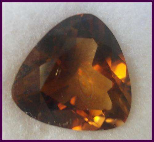 STUNNING  NATURAL TOPAZ  4.61CT  BROWNISH ORANGE TRILLION (WITH CERTIFICATE)