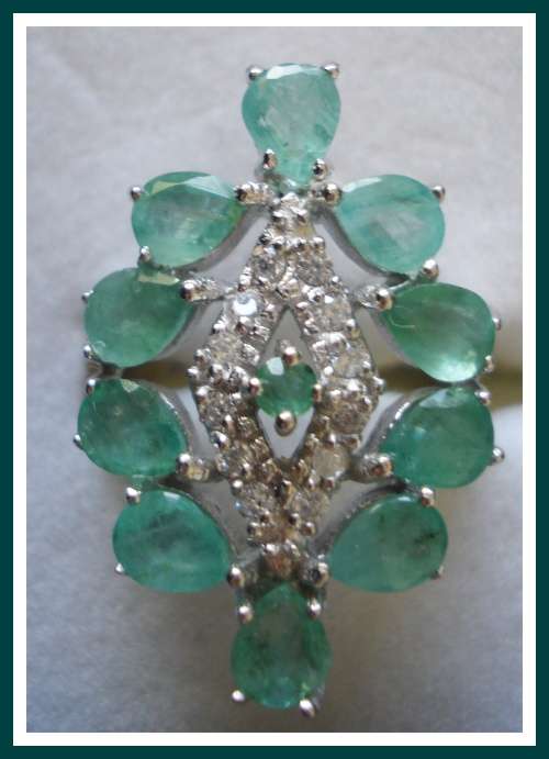 EXQUISITE  .925  STERLING SILVER RING WITH NATURAL EMERALDS