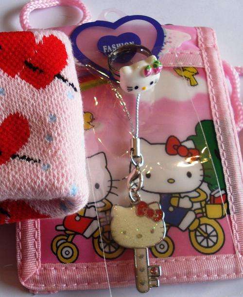 HELLO KITTY PACK - 1 purse, 1 ring and 1 cell charm. also heart arm band