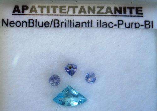 BEAUTIFUL APATITE WITH 3 SMALL TANZANITES  TOTAL .0415CT